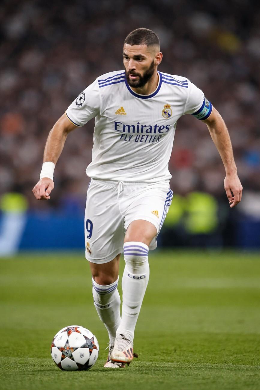Karim Benzema playing football in action on the field, showcasing his skills and focus, representing Karim Benzema Net Worth 2026