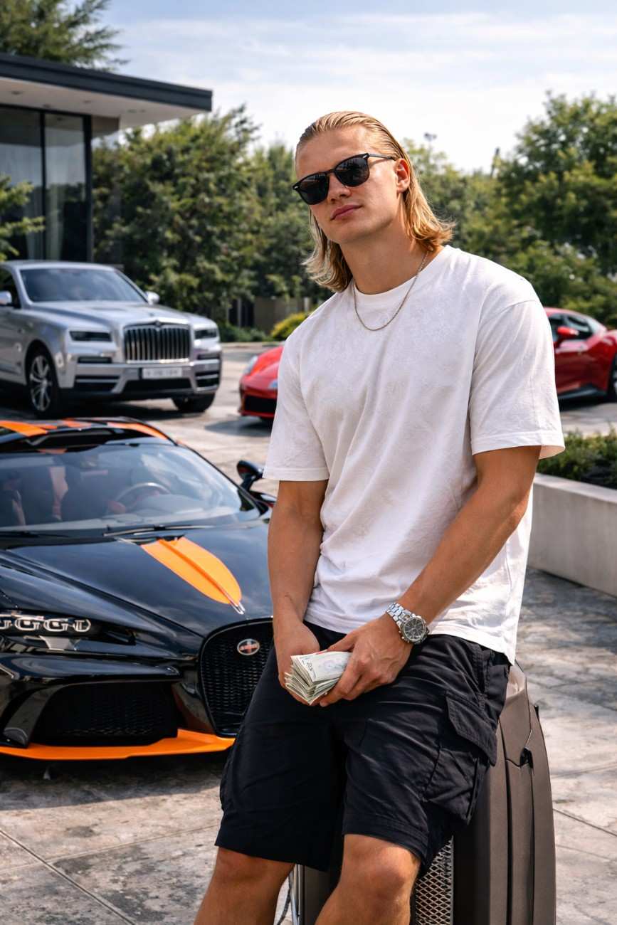 Erling Haaland posing in front of luxury cars with a mansion background, showcasing his high-end lifestyle and wealth