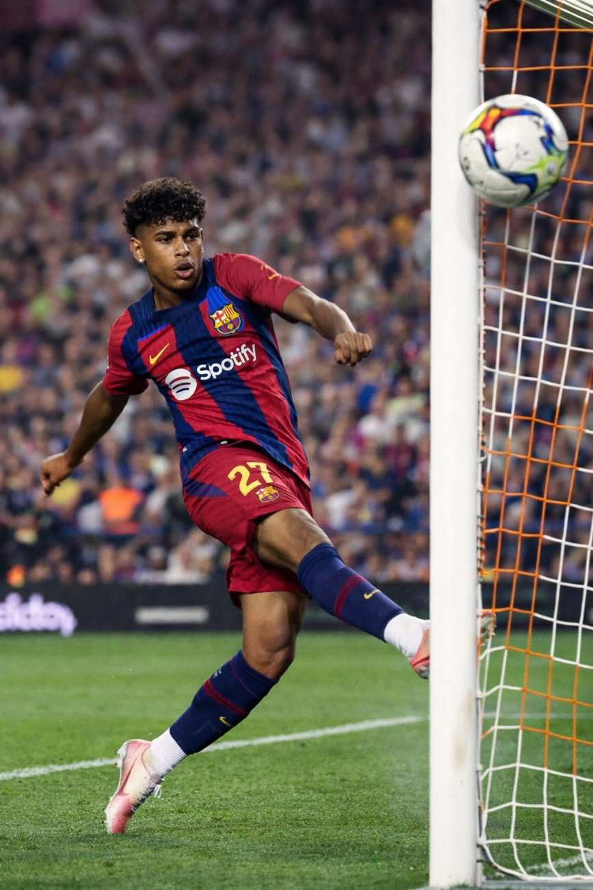 Lamine Yamal scoring a goal on the football field, showcasing his talent – Lamine Yamal Net Worth 2026